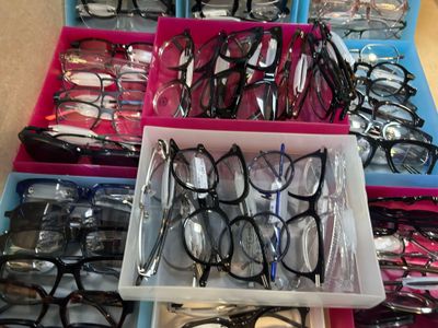 a lot of glasses that are sitting in a box