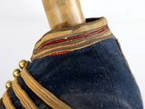 a close up of an umbrella with a wooden handle