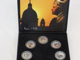 an image of a box of six coins with a picture of a man in a helmet