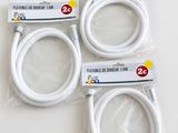 four pieces of white flexible cable in plastic bags on a white surface