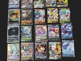 beaucoup de cartes pokemon différentes sur la table