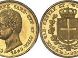 a gold sovereign coin with a crown on top of it