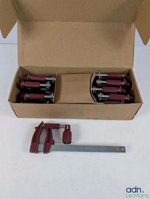a cardboard box with a pair of tools inside of it