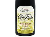 a bottle of wine that is sitting on a table