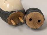 two wooden objects that are sitting next to each other