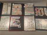 a lot of different stamps on the pages of a binder