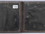 pair of antique wooden picture frames with labels on them