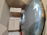 a box with a large metal object inside of it