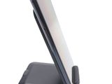 a cell phone that is sitting on top of a stand
