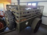 a green truck with a star on the back of it