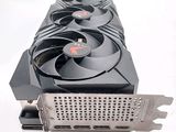 a close up of a video card with a fan on top of it