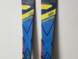 pair of skis leaning up against a wall in a room