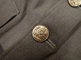 a close up of a button with a coin on it