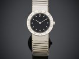 une montre Bulga pour femme, avec cadran noir et lunette sertie de diamants