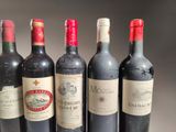 six bottles of red wine are lined up in a row