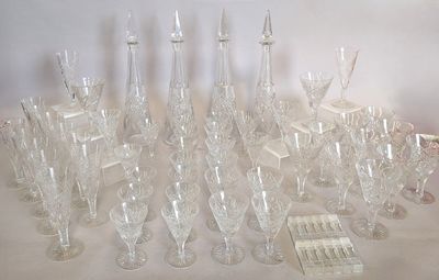 a lot of glass vases that are on a table