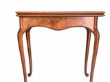 an image of a small wooden table on a white background
