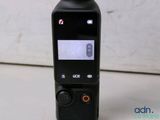 a small camera that is sitting on a table