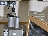 a picture of a kitchen with a chalk board and a mixer