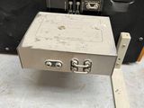 a metal box that is sitting on the floor