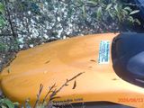 a motor scooter that is parked in the grass