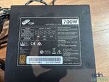 a close up of a computer power supply on a table