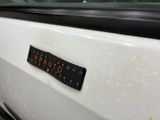 a close up of a sticker on the side of a car