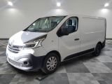 a picture of a white van on a checkered floor