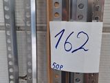 un grand nombre de barres métalliques empilées les unes sur les autres