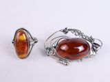 pair of silver and carneline rings