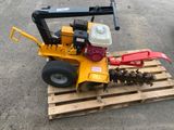 a small machine that is sitting on a pallet
