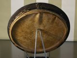 a pan that is sitting on a stand on a table