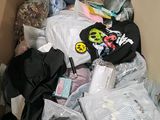 a box full of clothes and other items in it