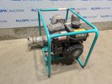 a close up of a pump on a cart in front of a wall