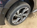 a close up of a tire on a car ' s rim