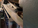 a shelf with a bunch of plates and bowls on it