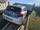 a car that is sitting on the back of a truck