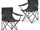 pair of black folding chairs with a bottle of beer on each of them