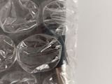 a bag of chocolates wrapped in plastic on a table