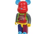 a toy bear that is wearing a vest and boots