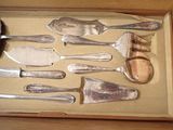 a box with a variety of silverware in it
