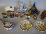 many different types of pottery on the table