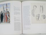 an open book with a drawing of people on it