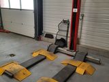 several pieces of equipment that are on the floor in the garage
