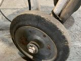 a close up of a wheel on a small plane