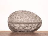 a glass container sitting on top of a wooden table