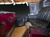 a couch and a table in the back of a car