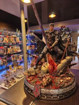 a statue of a man riding a horse with a sword