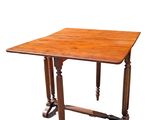 an image of a small table with a wooden top