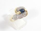 an image of a ring with a sapphire and diamonds on it